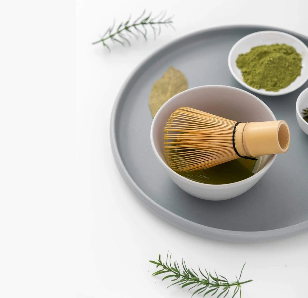 Bamboo matcha whisk being cleaned and cared for after use