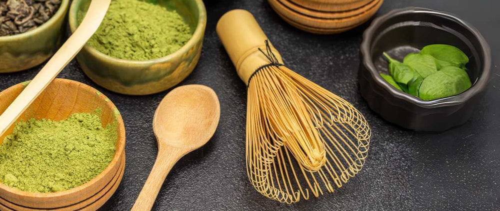 Bamboo matcha whisk beside practical alternative mixing tools