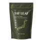 A 50g stand-up pouch of TAY LEAF Kyoto Teien matcha green tea, featuring a dark olive green packaging with white and gold text and a map of Japan.