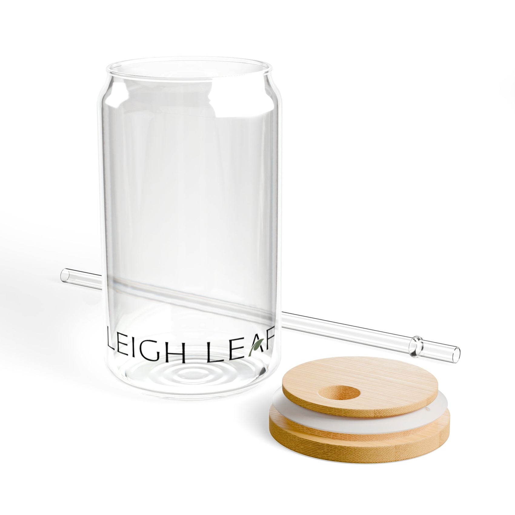 The components of the Leigh Leaf Elegant 16oz Matcha Sipper Glass including the clear glass, bamboo lid, and straw, highlighting its versatility for matcha and more.